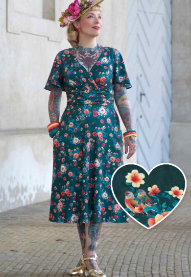Donna Cross Over Bust Flared Dress in Green Floral Print – Shop now at Kitty Darling
