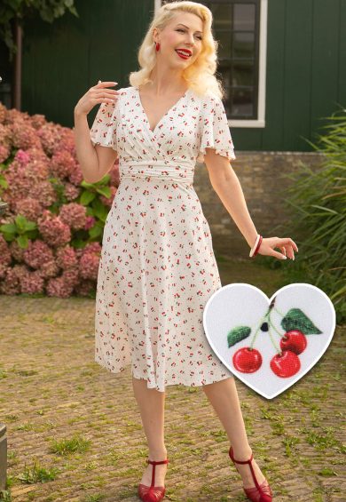 Donna Cherry White Crossover Bust Dress – Shop now at Kitty Darling