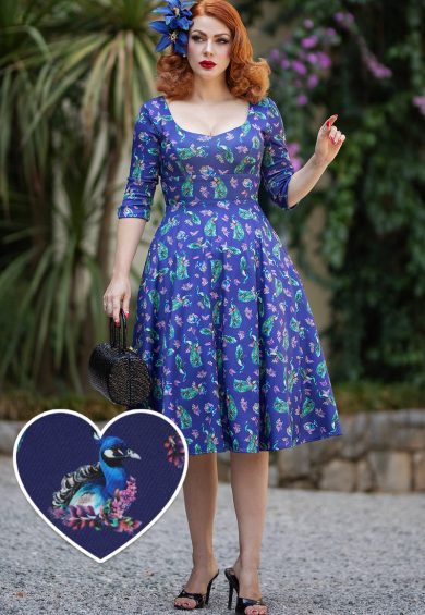 Scarlette Peacock in Purple Long-Sleeved Formal Dress – Shop now at Kitty Darling