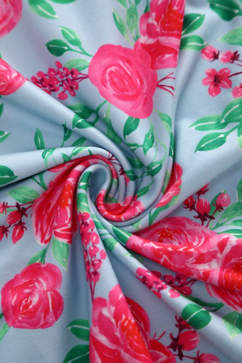 Julia Pink Rose Midi Dress In Baby Blue  Shop now at Kitty Darling