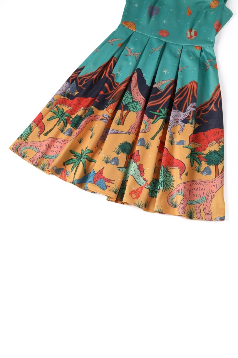 Amanda Turquoise Dinosaur World Print Swing Dress  Shop now at Kitty Darling