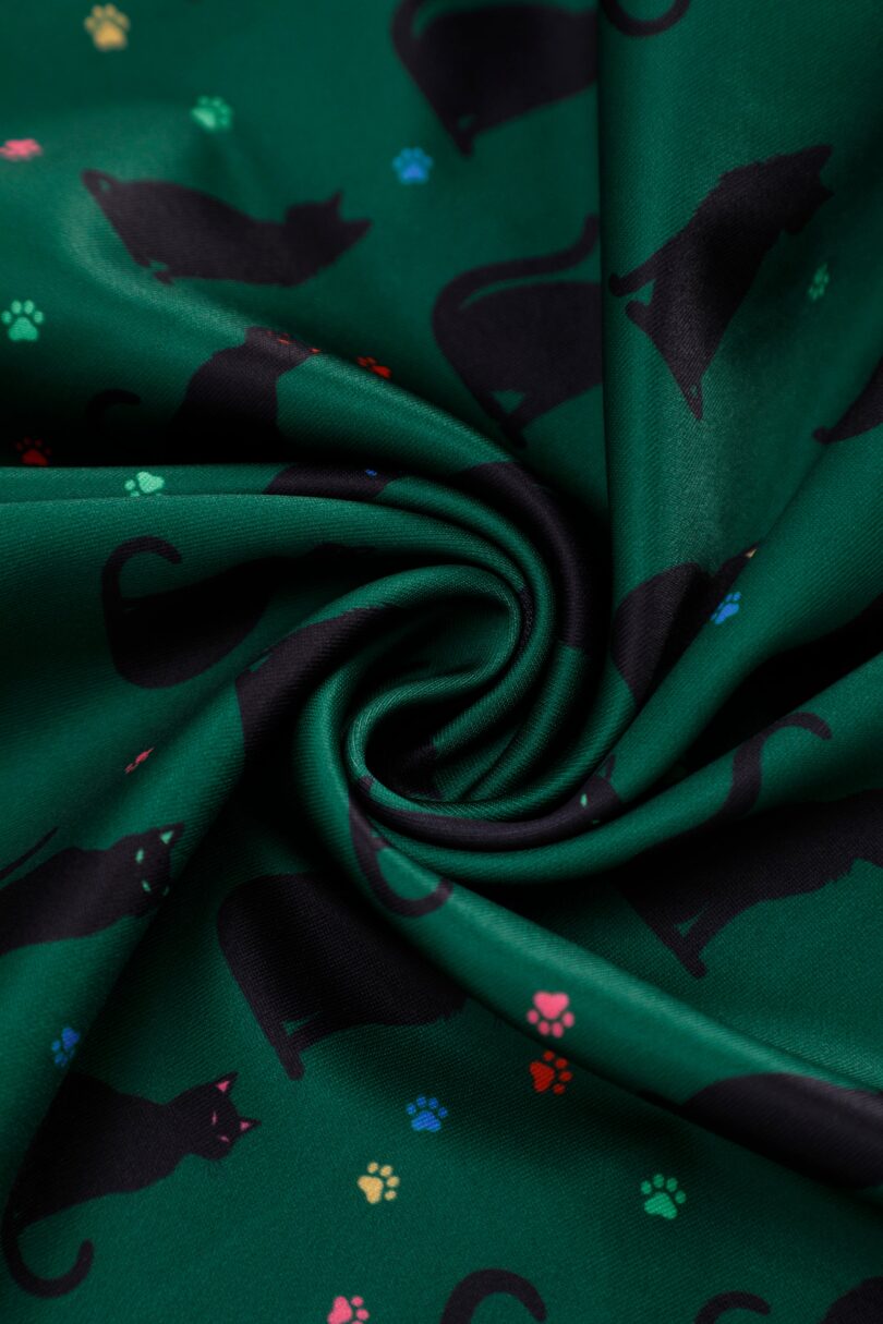 Aisley Black Cat Pleated Midi Skirt In Green  Shop now at Kitty Darling