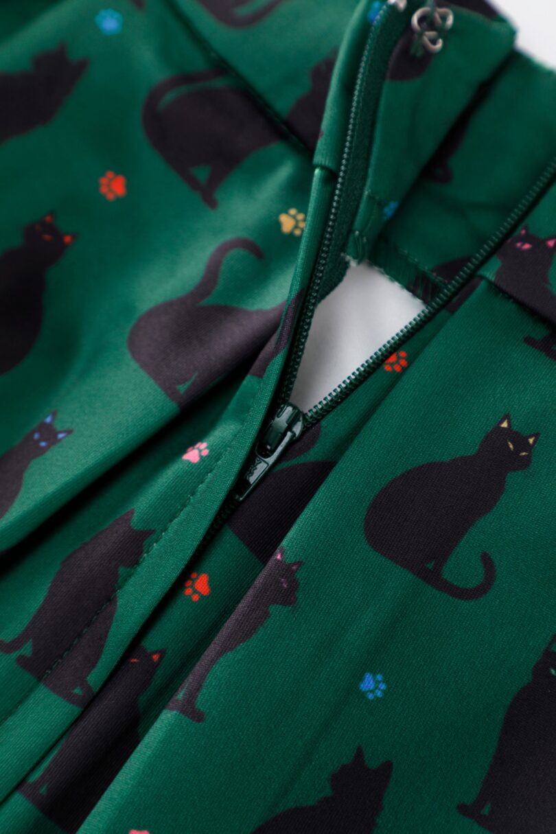 Aisley Black Cat Pleated Midi Skirt In Green  Shop now at Kitty Darling