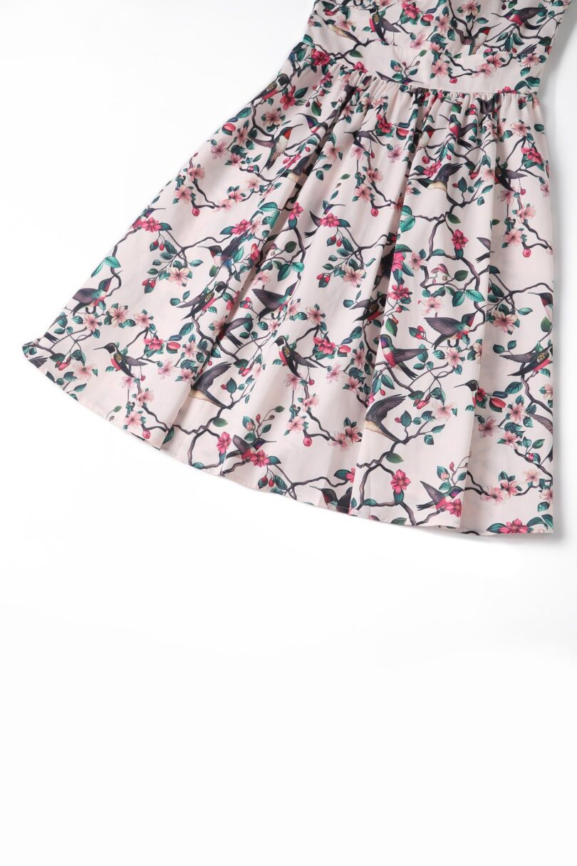 May V-neck White 50's Style Floral/Bird Print Swing Dress  Shop now at Kitty Darling