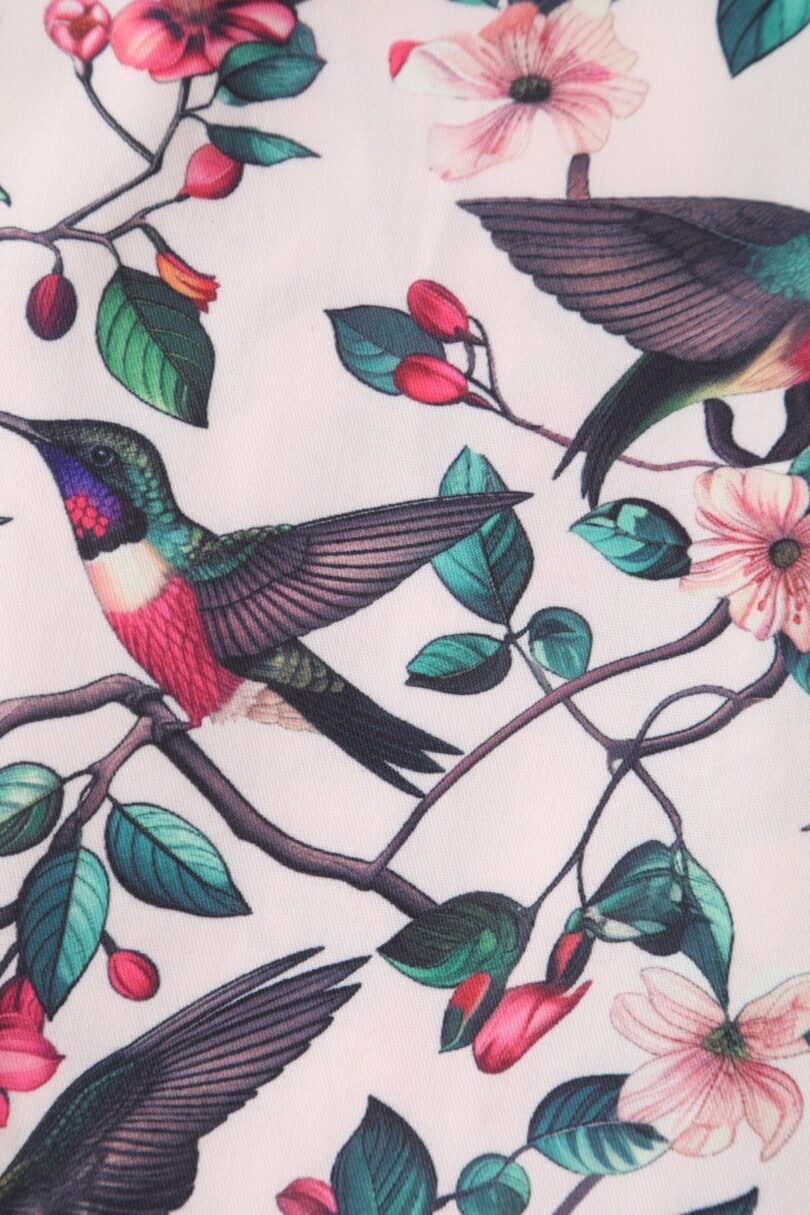 May V-neck White 50's Style Floral/Bird Print Swing Dress  Shop now at Kitty Darling