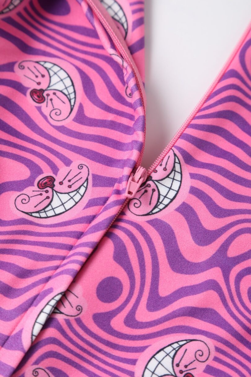 Charlotte Pink Cheshire Cat Smile Jumpsuit  Shop now at Kitty Darling