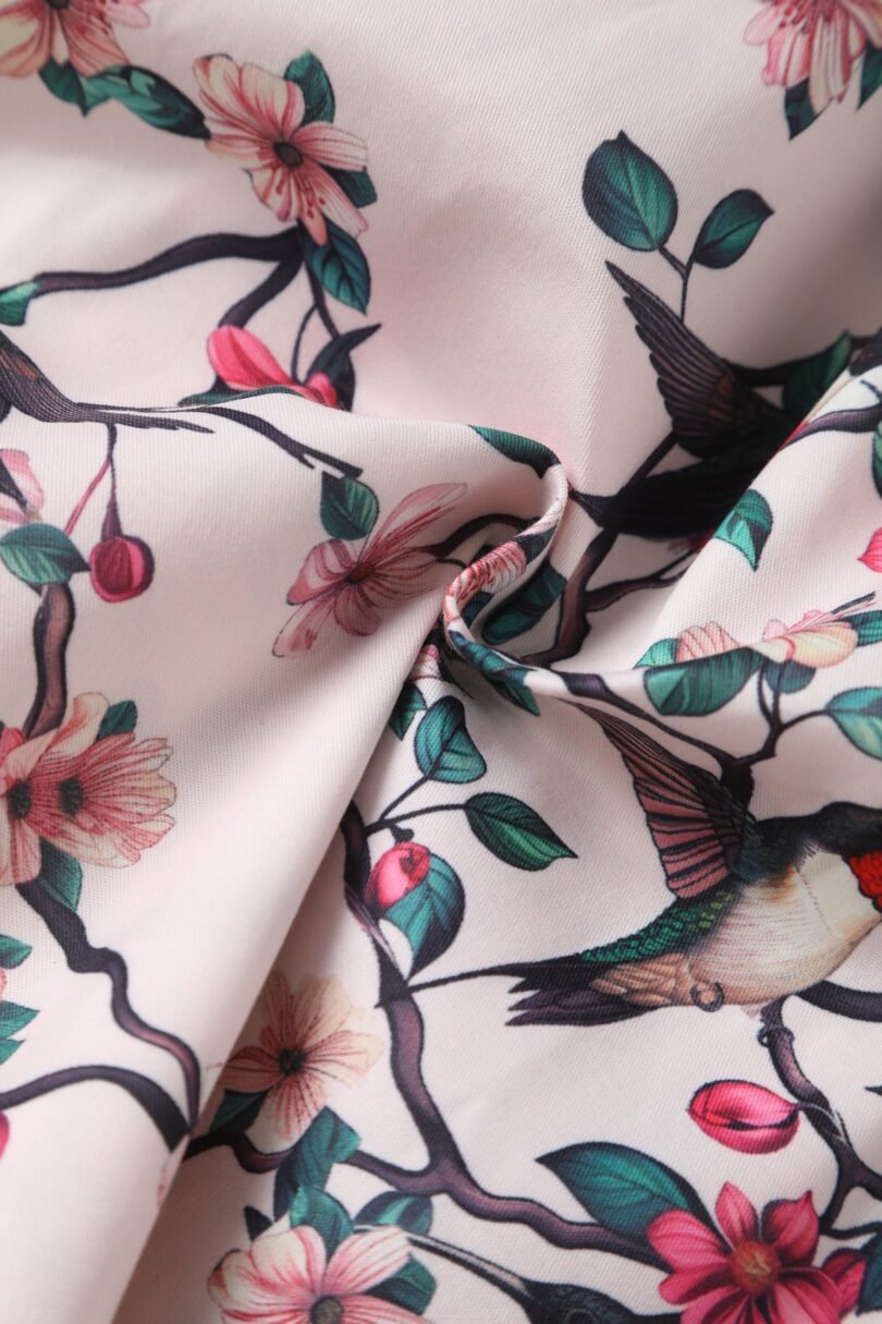 May V-neck White 50's Style Floral/Bird Print Swing Dress  Shop now at Kitty Darling