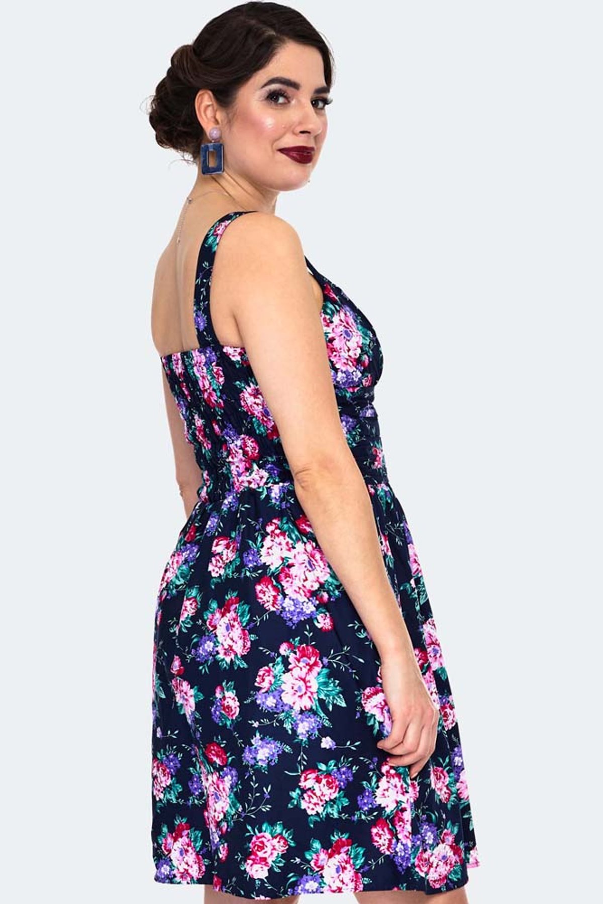 Navy Floral Flare Dress Navy Floral Flare Dress Shop now at Kitty Darling