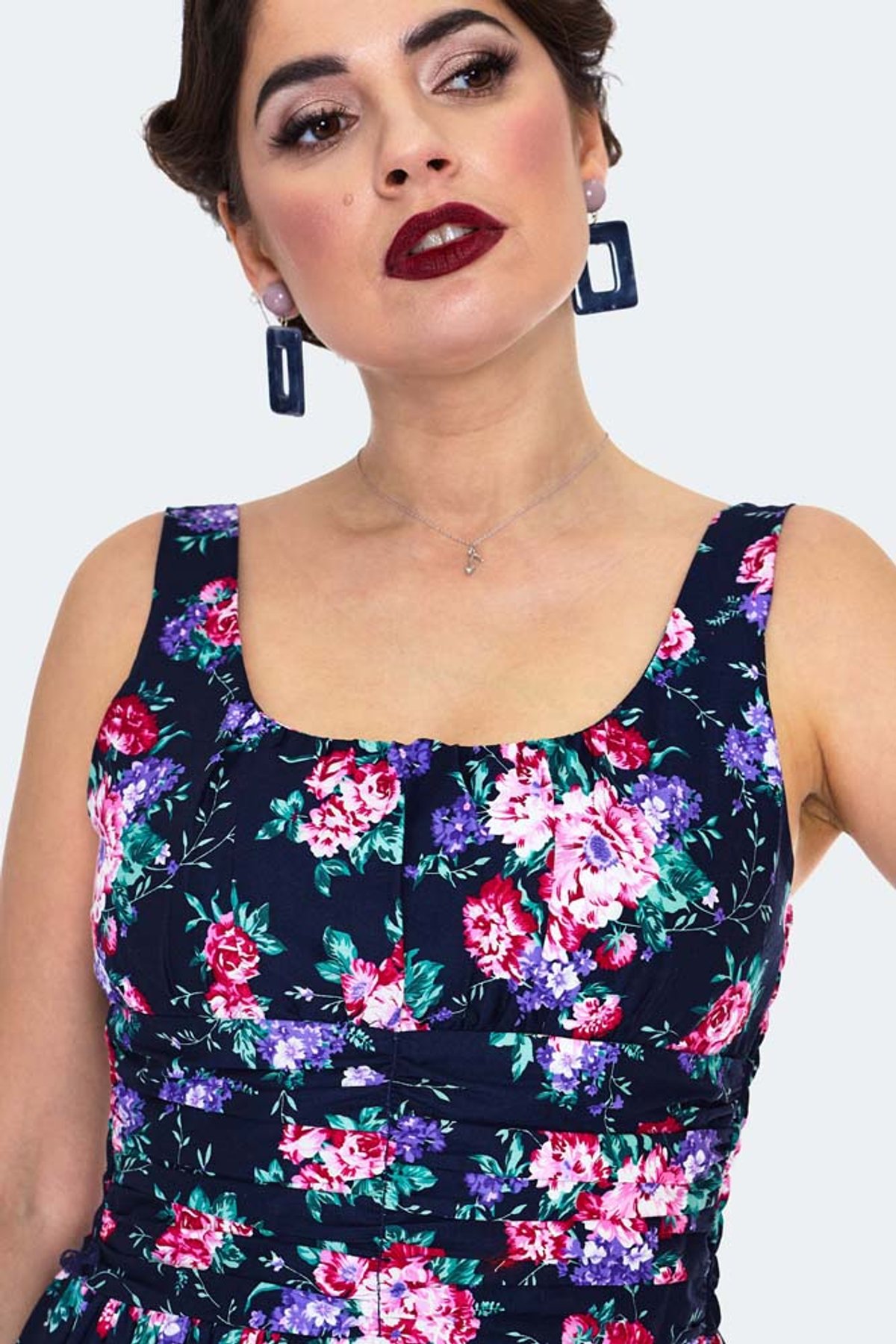 Navy Floral Flare Dress Navy Floral Flare Dress Shop now at Kitty Darling