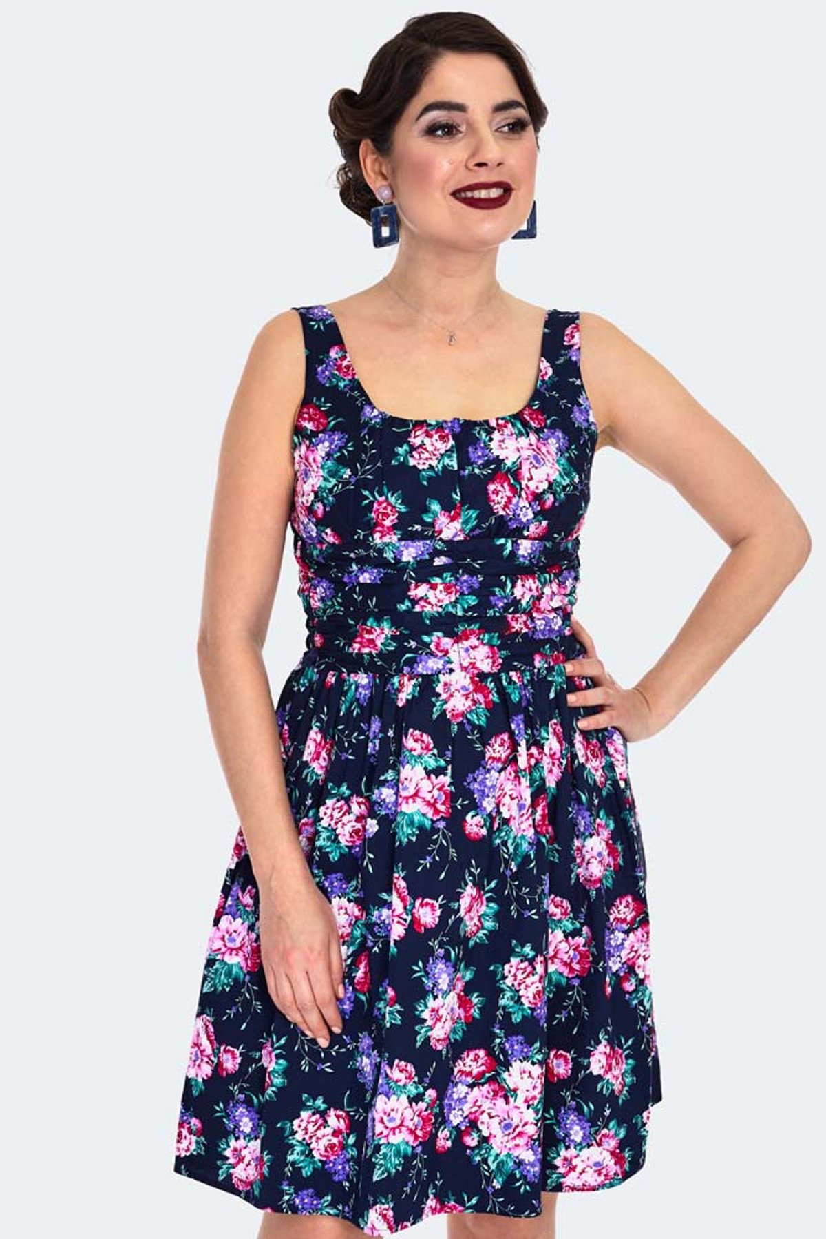 Navy Floral Flare Dress Navy Floral Flare Dress Shop now at Kitty Darling