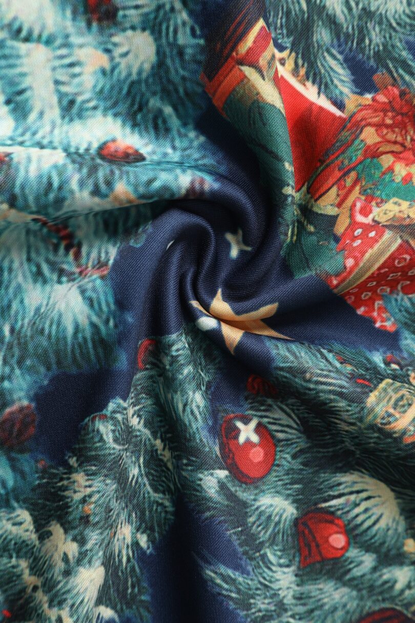 Amanda Dark Desaturated Blue Christmas Santa Print Dress  Shop now at Kitty Darling