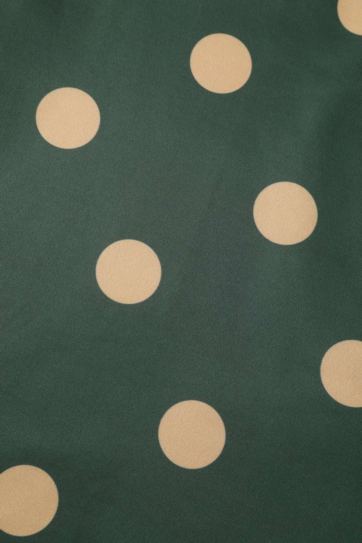 Maria Polka Dot Flared Dress In Green Maria Polka Dot Flared Dress In Green  Shop now at Kitty Darling