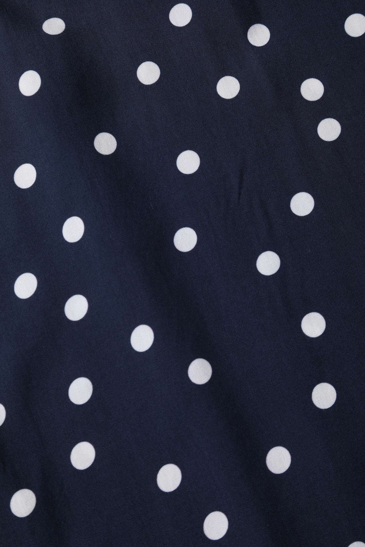 Estelle Midnight Blue Polka Dot Midi Skirt Estelle Midnight Blue Polka Dot Midi Skirt  Shop now at Kitty Darling