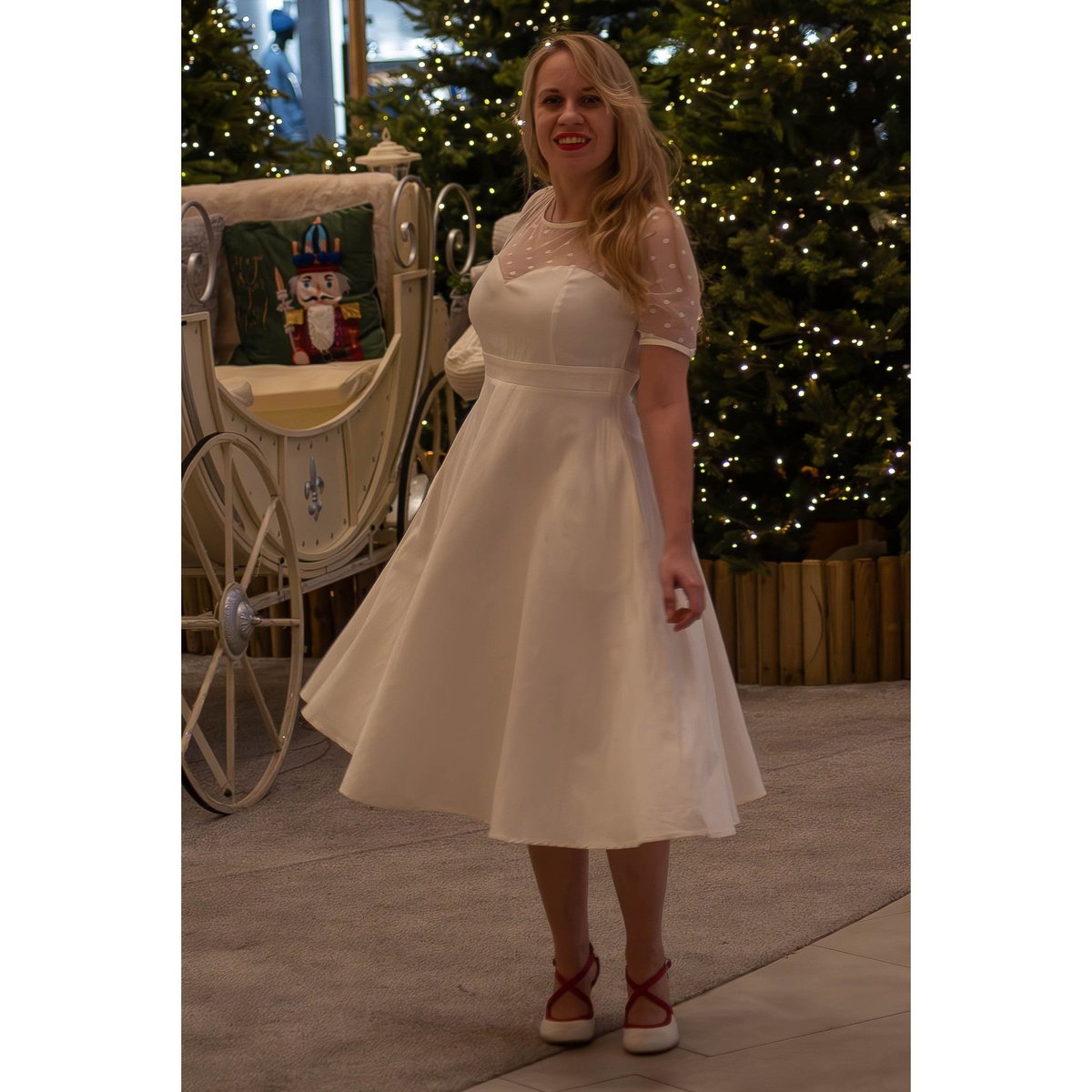 Elizabeth II Short Sleeved Polka Dot Mesh Wedding Dress Elizabeth II Short Sleeved Polka Dot Mesh Wedding Dress Shop now at Kitty Darling