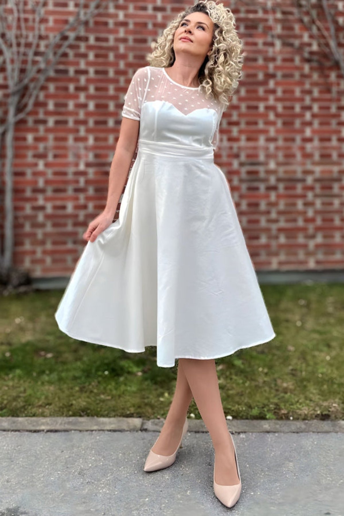 Elizabeth II Short Sleeved Polka Dot Mesh Wedding Dress Elizabeth II Short Sleeved Polka Dot Mesh Wedding Dress Shop now at Kitty Darling