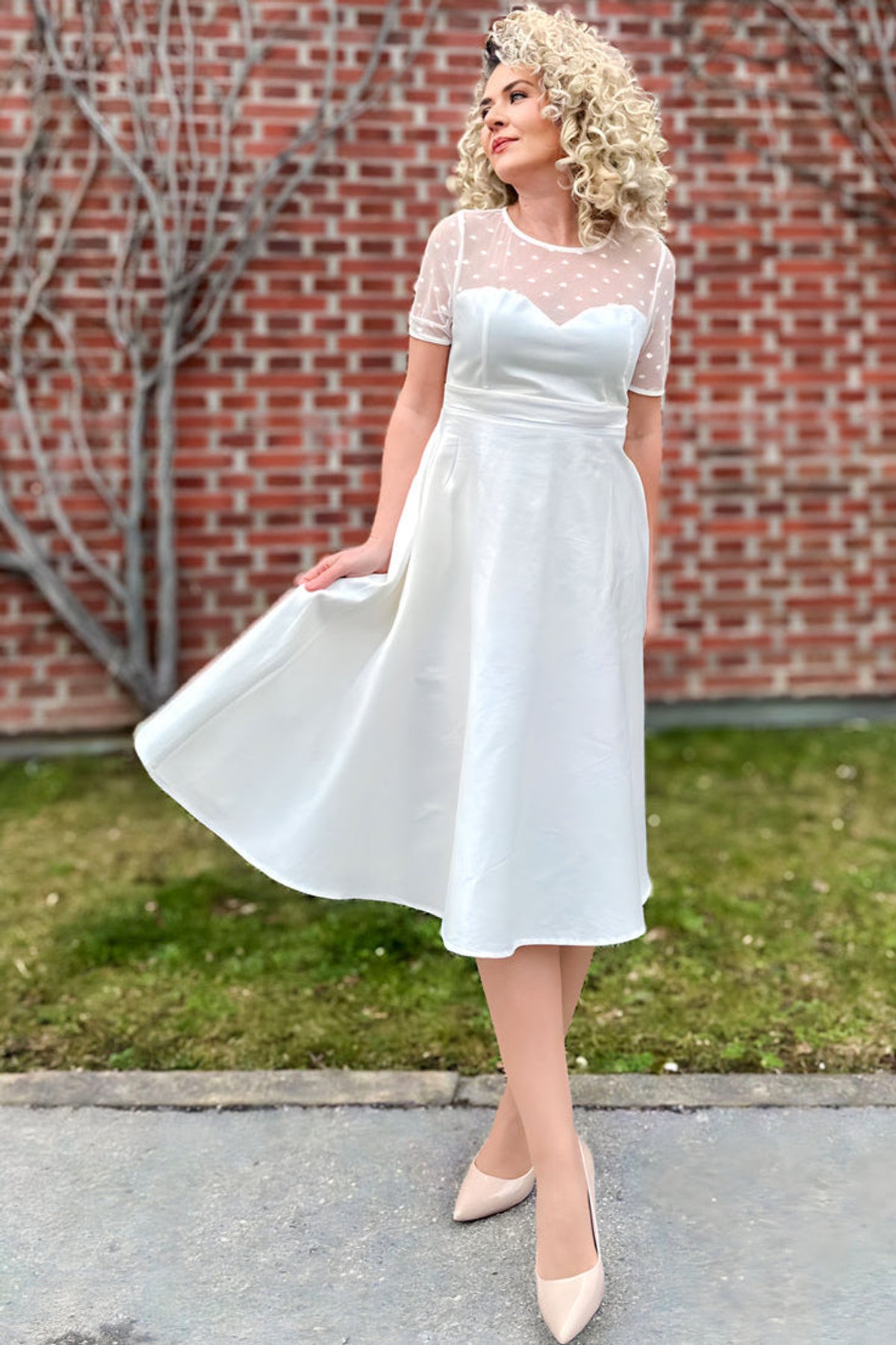 Elizabeth II Short Sleeved Polka Dot Mesh Wedding Dress Elizabeth II Short Sleeved Polka Dot Mesh Wedding Dress Shop now at Kitty Darling